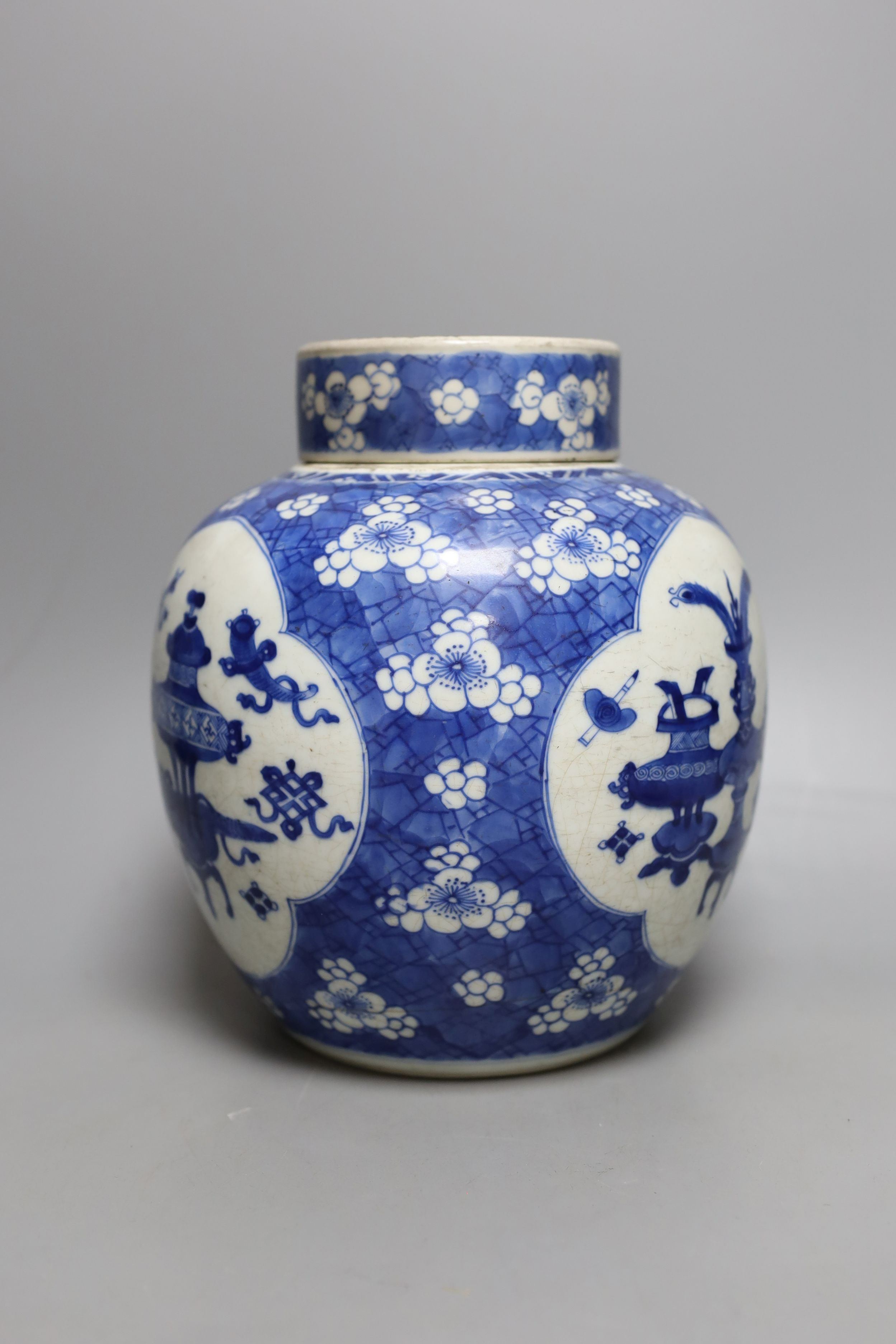 A Chinese Kangxi blue and white jar and cover 23cm